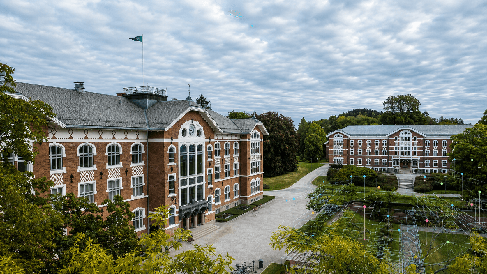 Urbygningen og Tårnbygningen ved NMBU med et diskret digitalt datalag over campusområdet